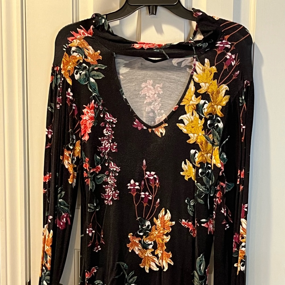 Long sleeve blouse with cutout in front